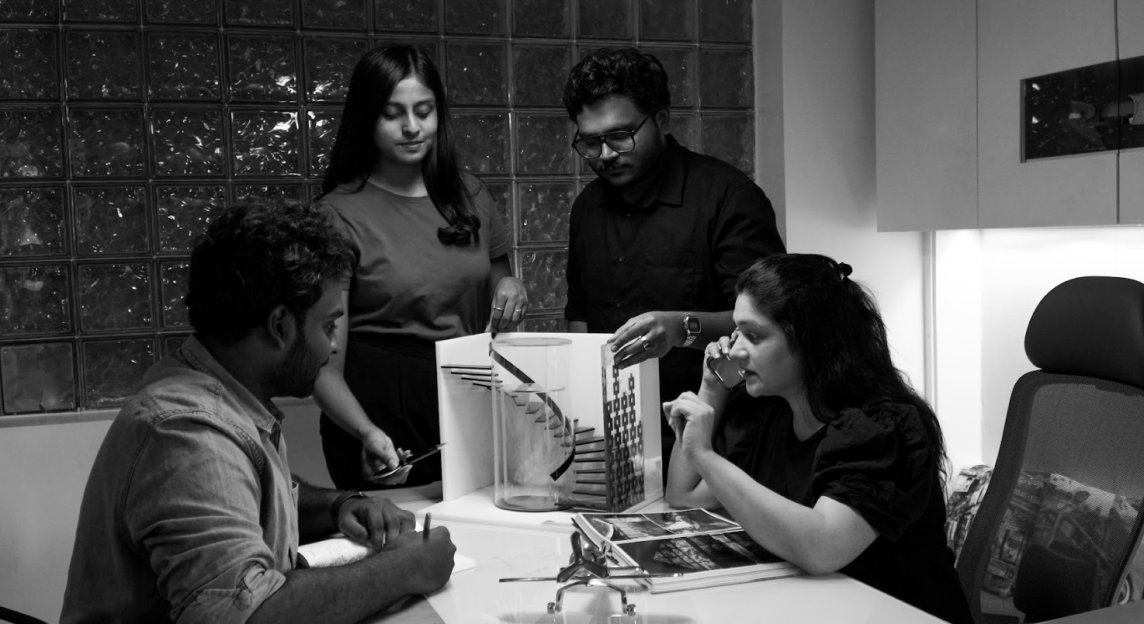 Feel and Bari architects reviewing a staircase model during concept development