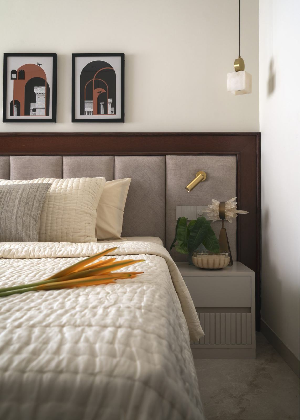 Brass reading light beside the bed in the Epure Residence master bedroom by Feel and Bari