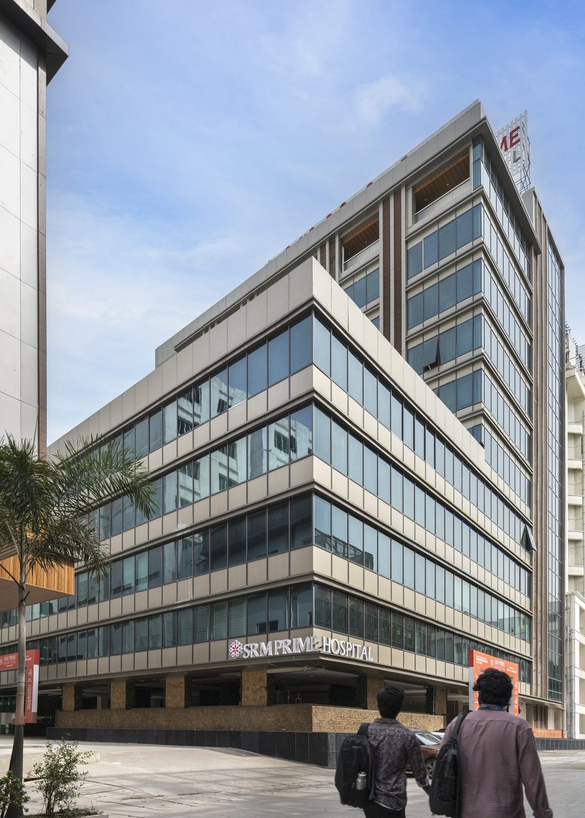 Glass facade of the SRM Multi-Specialty Hospital building in Chennai by Feel and Bari